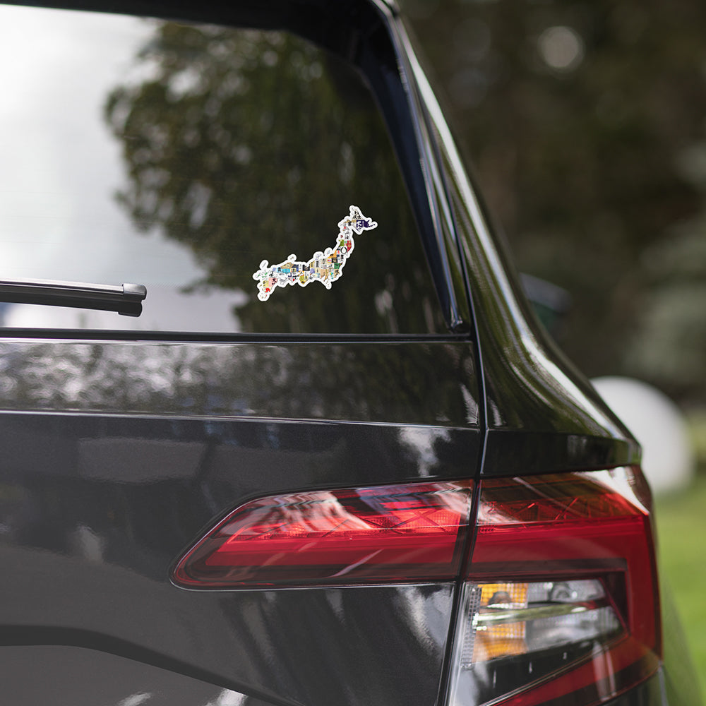 a colorful sticker of Japan on a car window