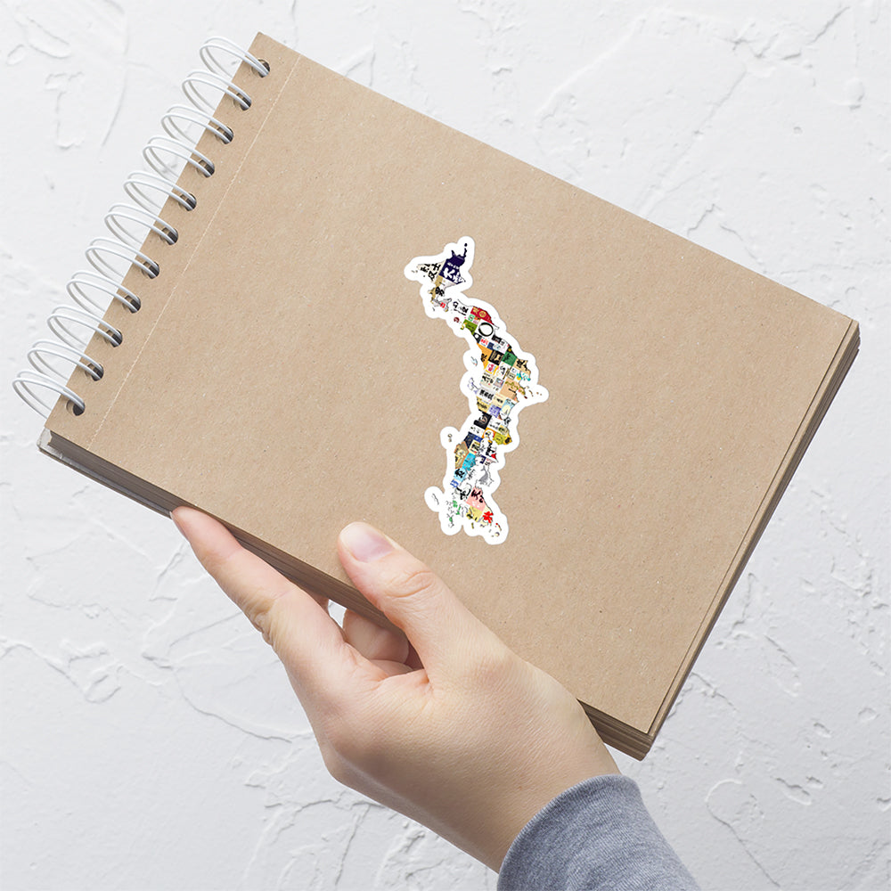 a sticker of Japan with a variety of sake labels on a brown spiral notebook