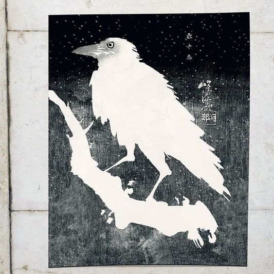 black and white print of a crow in the snow