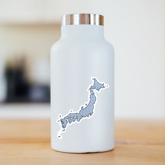 a blue sticker of Japan on a Hydroflask bottle